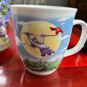 Savior Vivre 
Barkley Coffee Mug 
Made of Porcelain 
Crazy Golf Lady
POOS